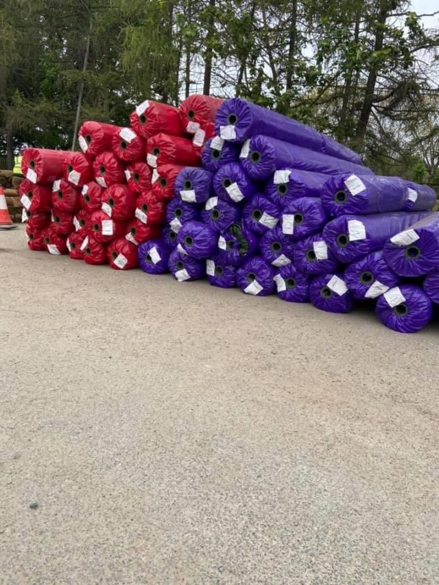 Rolls of artificial grass.